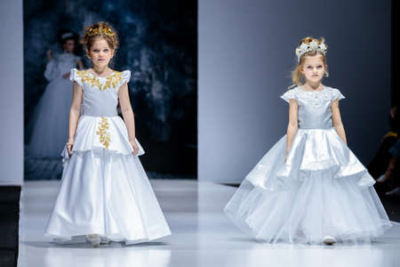 MOSCOW, RUSSIA - MARCH 21, 2019: Model walk runway for IRINA SCHARLAU catwalk at Fall-Winter 2019-2020 at Moscow Fashion Week. Kid's fashion.のeditorial素材