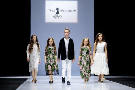 MOSCOW, RUSSIA - MARCH 21, 2019: Model walk runway for VERA DOMOKOSH catwalk at Fall-Winter 2019-2020 at Moscow Fashion Week. Kid's fashion.のeditorial素材