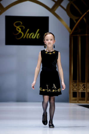 MOSCOW, RUSSIA - MARCH 21, 2019: Model walk runway for SAID SHAH catwalk at Fall-Winter 2019-2020 at Moscow Fashion Week. Kid's fashion.のeditorial素材