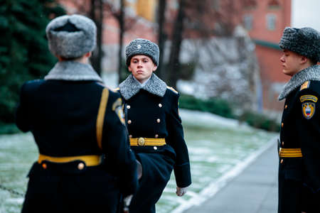 MOSCOW, RUSSIA - DECEMBER 04, 2019: Hourly change of the Presidential guard of Russia at the Tomb of Unknown soldier and Eternal flame in Alexander garden near Kremlin wall in winter uniformのeditorial素材