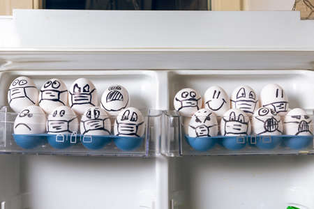violation of quarantine rules concept. close up of diverse chicken easter eggs with doodle emotional...