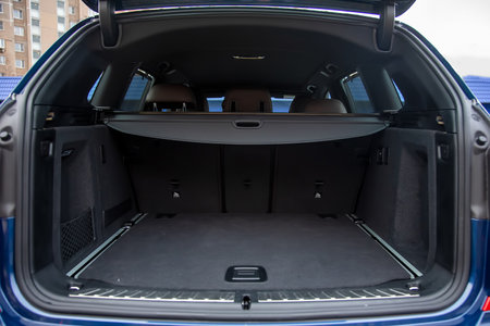 Moscow, Rusia - December 7, 2019: empty roomy open trunk of a premium new crossover BMW X 3 m-series, copy space, close up, soft focus, blur backgroundのeditorial素材
