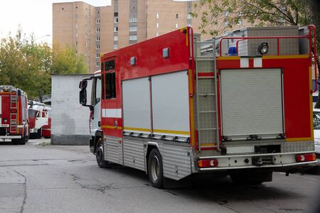 A line of fire engines. Fire in the room. Fire hazard. Failure to comply with fire safety...