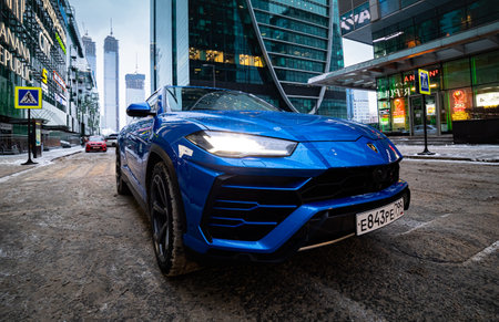 Moscow, russia - December 13, 2020: premium suv lamborghini urus stand on parking lots in downtown cityのeditorial素材