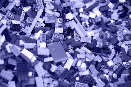 texture of colored toy bricks background colored very peri violet color. soft focus, top viewの写真素材