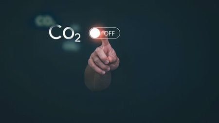 A person pressing a button to turn off carbon dioxide in a digital setting