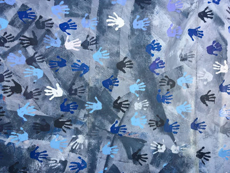 A vibrant pattern of hands in various colors on purple textured background.