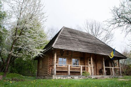 Small European-style resort wooden house or wooden hut in forest Old wooden house. Old wood in the countryside. Near is beautiful forestの写真素材