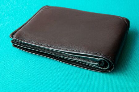 Empty wallet with no money in the background. Bankruptcy is an empty wallet. It is not possible to repay the loan and mortgage. Old and empty black walletの写真素材