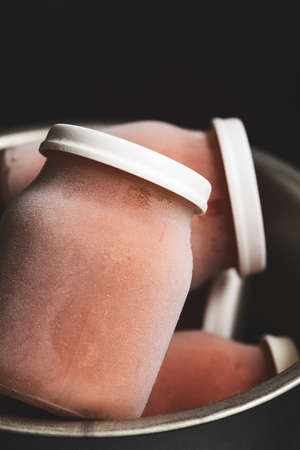 Frozen tomato sauce in the bottlesの写真素材