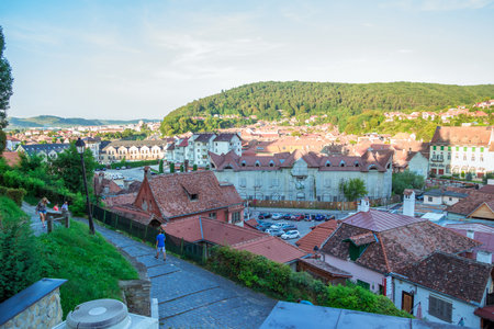 Sighisoara, Romania - August, 2019: Panoramic view of Beautiful colorful houses in Sighisoara, Romania. This town is the place Dracula is born. Amazing medieval city in the midle of Transylvania.のeditorial素材