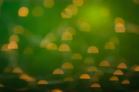 Blurred christmas background. Red bokeh abstract light backdrop. Beautiful images from steam and lights. Magic light bokehの写真素材