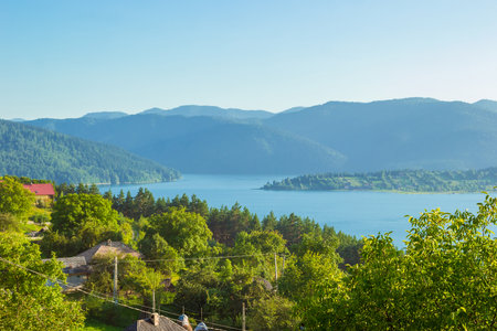 Landscape of Lake Bicaz with Ceahlau Massif on the background. Beautiful view of Lakul Izvorul Muntelui, Lake Bicaz, in Eastern Carpathians, the biggest artificial lake in Romania. transylvania.の写真素材