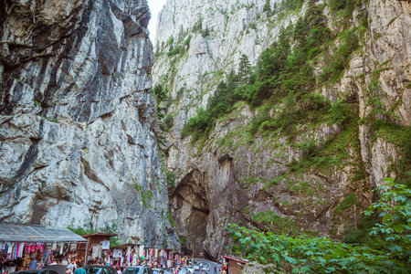 Bicaz Gorges, Romania - August, 2019 : Tourists visit the Bicaz Canyon. Bicaz Key is one of the most spectacular roads in Romania. Tourist souvenir fair in Transylvaniaのeditorial素材