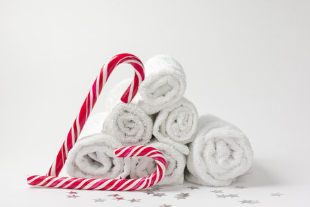 Christmas composition with towels and candies. Christmas tree from towels. Christmas, hygiene and...