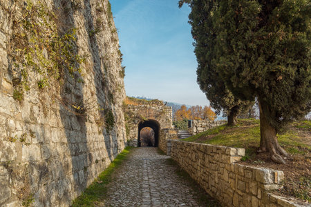 Brescia, Italy - December, 2015: way in the castle of the city Brescia on a sunny day against a blue sky. Part of Brescia castle on the hill Cidneo. view on the arch. Castello di Brescia, Lombardyのeditorial素材