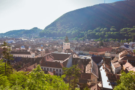 Breathtaking panoramic view of Old Town Brasov and Mountain Tampa in summertime, Transylvania,...