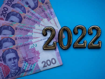 Close up of Ukrainian money with a face value of 200 hryvnia. Background of the two hundred hryvnia banknotes and 2022. Enterprise capital investment, finance, savings, corruption and bank conceptの写真素材