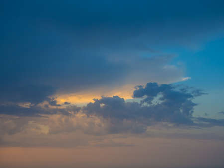 Morning sky with clouds after thunderstorm. Background with different shades of blue, cyan and gray...