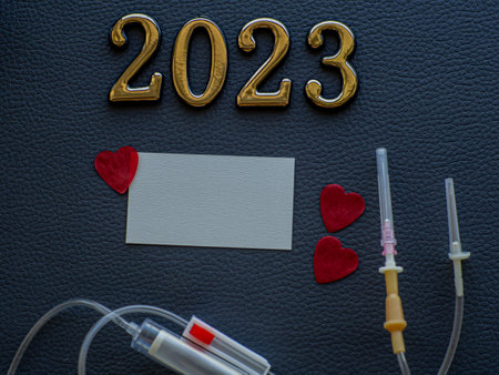 2023, medicine and donating blood concept. Close up view photo of 2023 and place for text on dark...