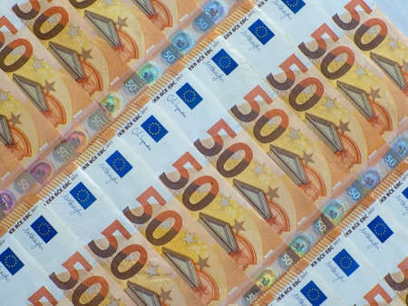 A set of European Union money with a face value of 50 euros. Background of the fifty euro banknotes...