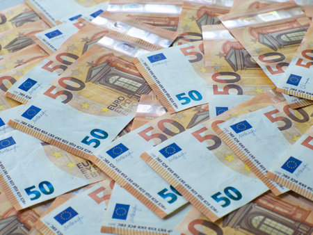 A set of European Union money with a face value of 50 euros. Background of the fifty euros banknotes with copy space. Enterprise capital investment, finance, savings, corruption and bank concept.の写真素材