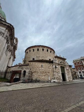 The Duomo Vecchio or Old Cathedral (also called La Rotonda), a Roman Catholic church in Brescia, Italy. The view of Old Cathedral of Brescia in Piazza Paolo VI in summer morning.の写真素材