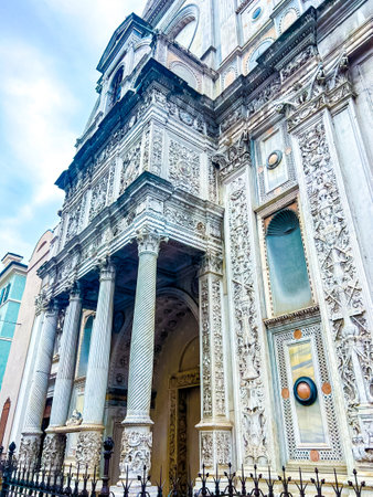 Old medieval cathedral in the summer morning. Beautiful italian church Saint Maria of Miracles. Chiesa di Santa Maria dei Miracoli, Brescia, Italy. Side view.の写真素材