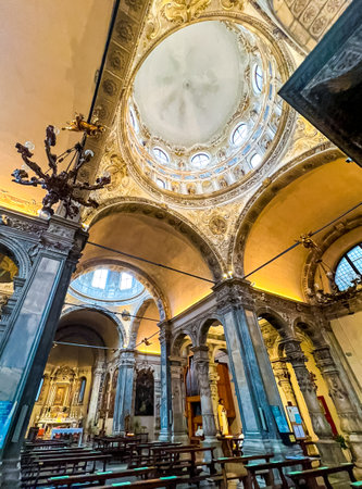 Old medieval cathedral in the summer morning. Beautiful italian church Saint Maria of Miracles. Chiesa di Santa Maria dei Miracoli, Brescia, Italy. Side view.の写真素材