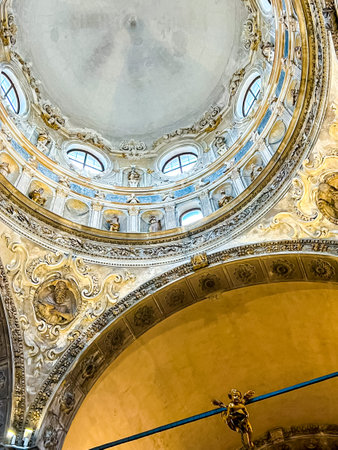 Old medieval cathedral in the summer morning. Beautiful italian church Saint Maria of Miracles. Chiesa di Santa Maria dei Miracoli, Brescia, Italy. Side viewの写真素材