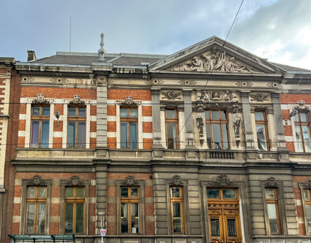 The royal conservatory of brussels showcases an impressive facade featuring intricate architectural designs and elegant sculptures, capturing the essence of belgian artistry and culture.の写真素材