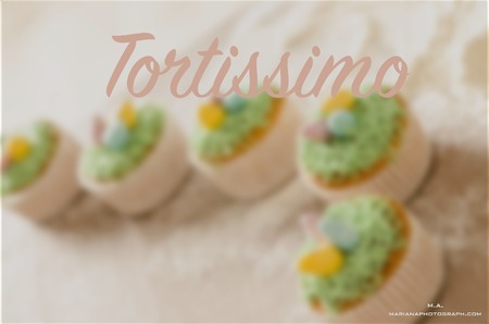 Beautiful cute Easter cupcakes with decorations, word tortissimoの写真素材