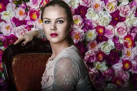 Portrait of Beautiful woman with flowersの写真素材