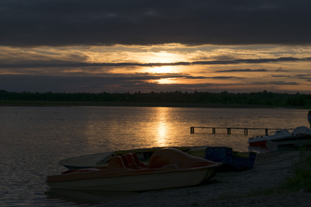 A nice sunset over the lake surfaceの写真素材
