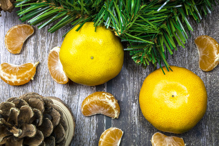Fresh tangerines on a wooden table.の写真素材