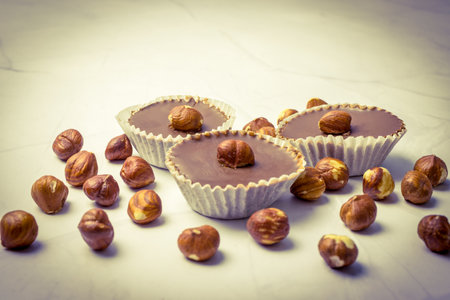 Sweet chocolate cupcakes with nut filling.の写真素材