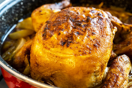 Baked fresh chicken in marinade.の写真素材