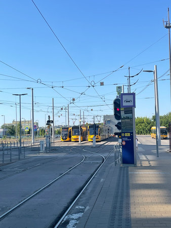 Modern Tram Station in a Busy Urban Areaの写真素材