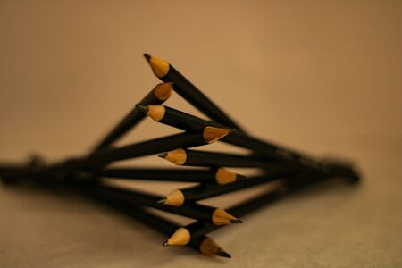 Arranged pencils to form abstract shapes