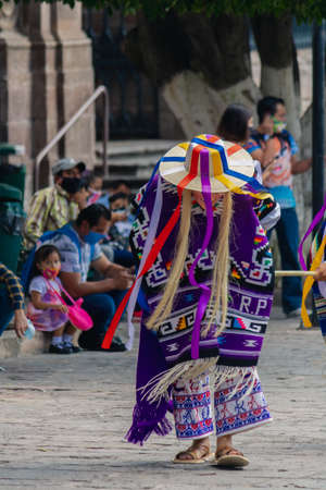 MORELIA, MEXICO - OCTOBER 31, 2020: Traditional dance of the old men in the main square of Morelia,...