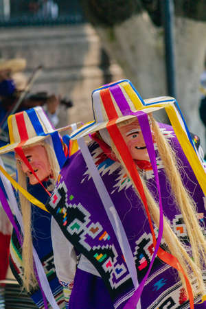 MORELIA, MEXICO - OCTOBER 31, 2020: Traditional dance of the old men in the main square of Morelia, Mexicoのeditorial素材