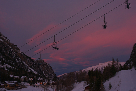 chairlifts at sunsetの写真素材