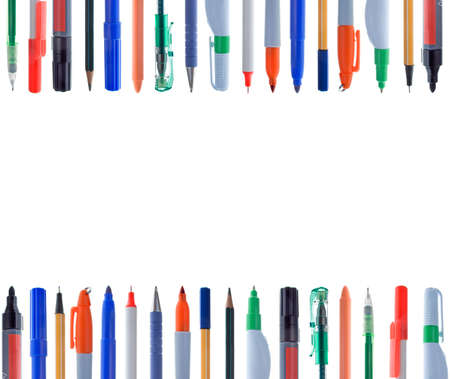 Different writing instruments in alingment. Isolated on white. White space at the center.の写真素材