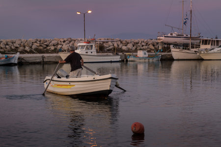 old fisherman before sunriseの写真素材