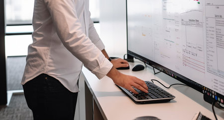 Businessman working on computer at office. business and finance concept. Generative AIの素材