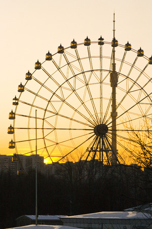 Ferris wheel at VDNH in Moscow against the starry sky at sunsetの写真素材