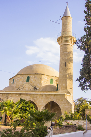 Mosque view from outside in the city of Larnaca Cyprus with a catの写真素材