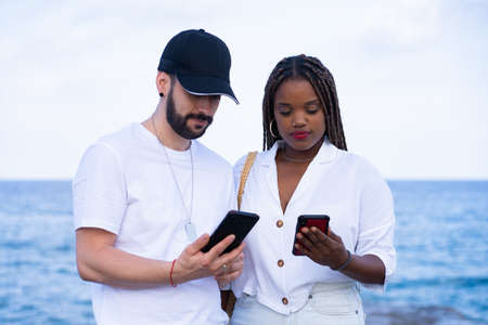 Two friends Laughing with Funny Media on Mobile