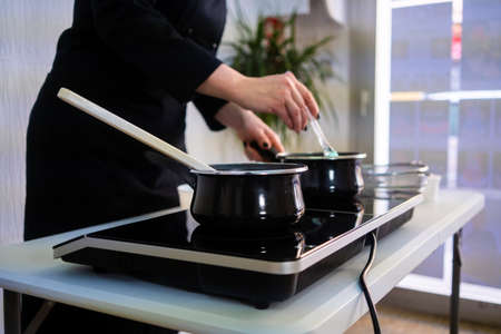 Pastry chef making a beautiful and delicious cake.の写真素材