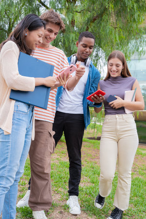 Students having fun with mobile phones creating content on social media.Vertical